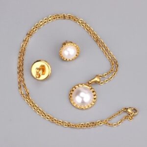 set acero dorado redondo con perla