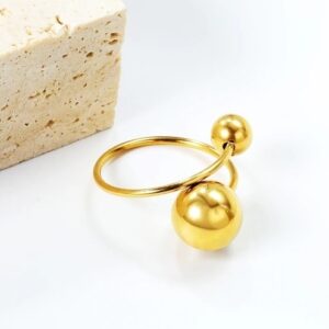 anillo acero dorado doble bola