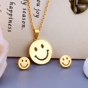 set acero dorado carita feliz
