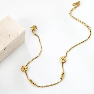 tobillera acero dorada flores